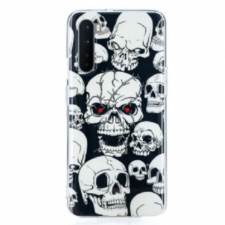 Coque OnePlus Nord Attention Têtes de Mort Fluorescente