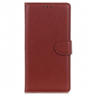 Housse iPhone 14 Traditionnellement Litchi