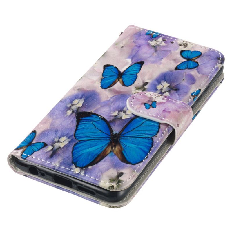 Housse Samsung Galaxy S24 FE Fleurs Violettes et Papillons Bleus