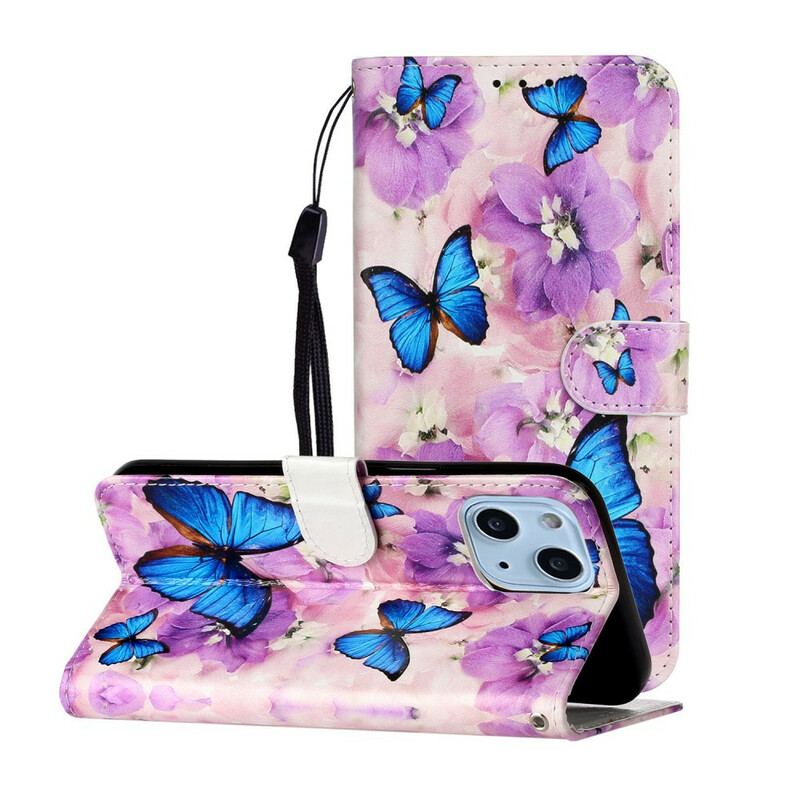 Housse iPhone 13 Mini Papillons Bleus dans les Fleurs