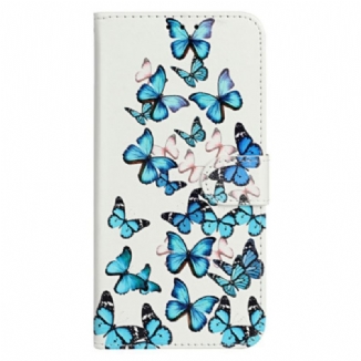 Housse iPhone 16 Plus Vol de Papillons Bleus